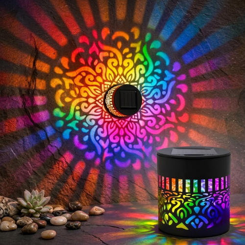 Solar mandala projector casting rainbow mandala on stone wall